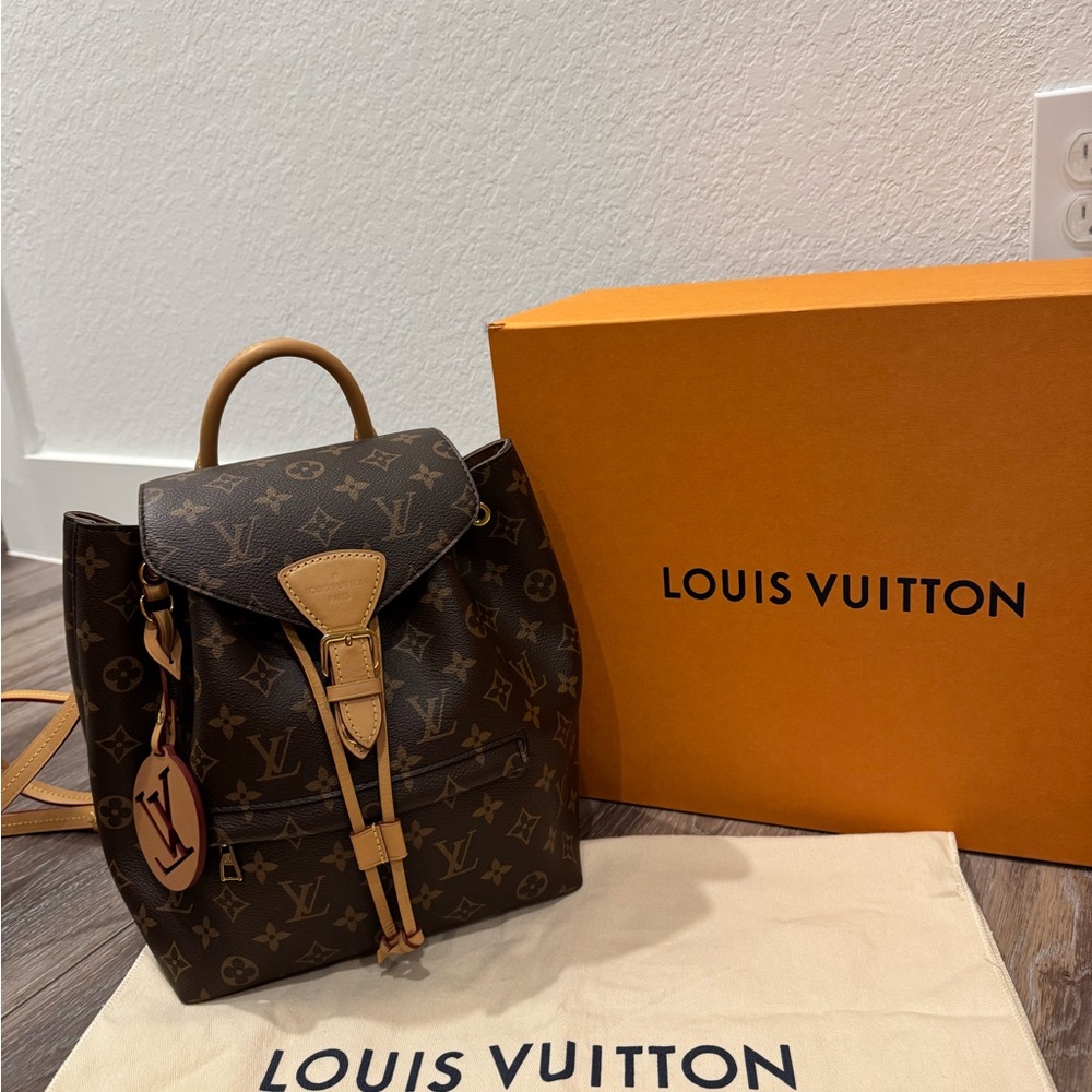SOLD Louis Vuitton Brown Monogram Backpack